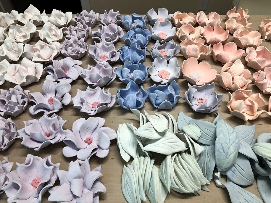 colored paper porcelain flowers ready to glaze